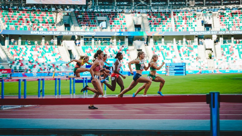 Athletes compete in an intense women's hurdles event at Minsk stadium, showcasing speed and agility., tags: world athletics ultimate die leichtathletik - pexel